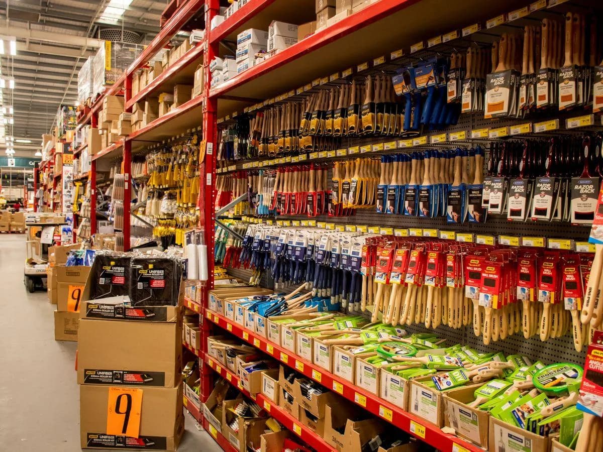 Hardware store aisles stocked with tools and building supplies