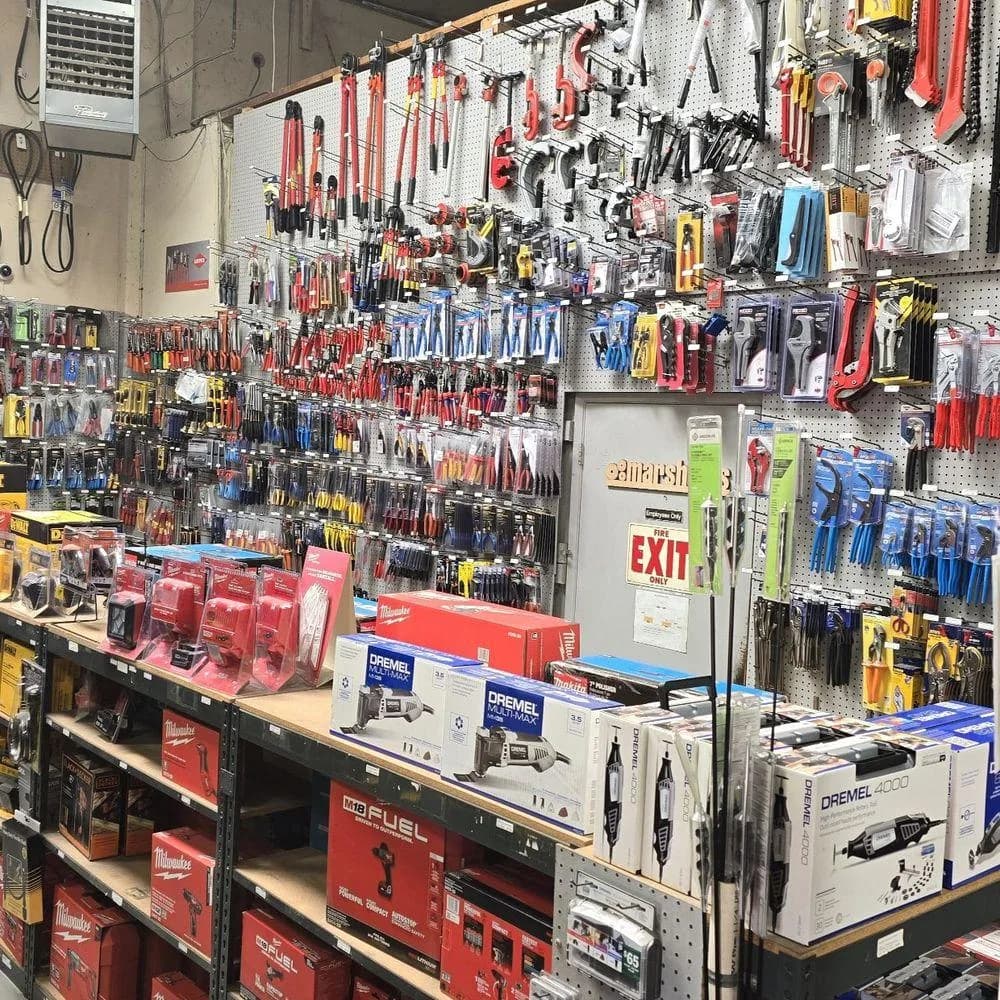 Hardware products displayed along a store aisle